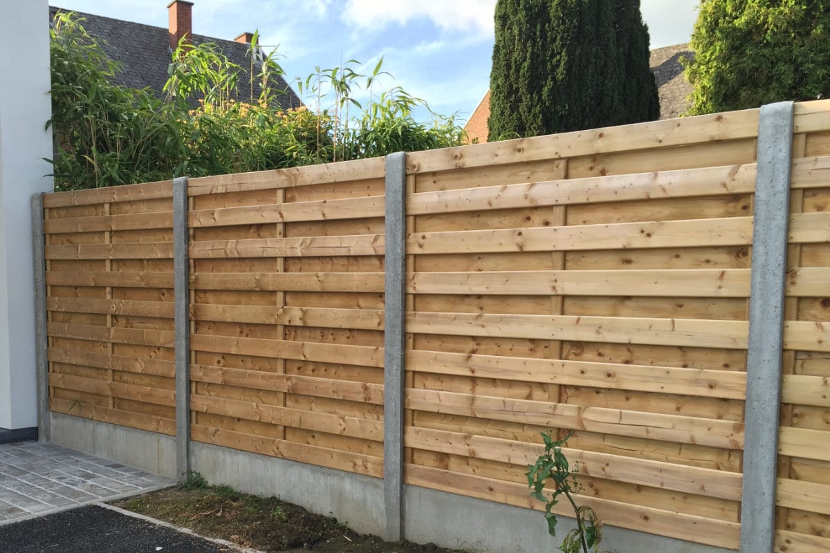 wood fence with concrete